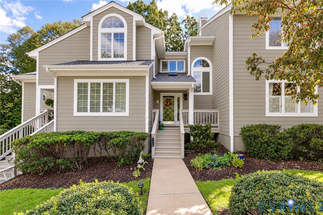 3131 Stony Point Road, #B, Richmond, VA 23235 Multi-level exterior with siding, arched windows, and white trim