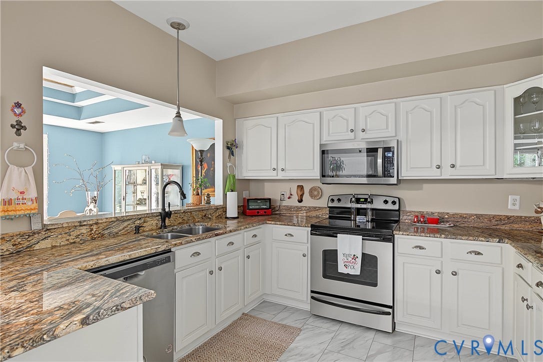 3131 Stony Point Road, #B, Richmond, VA 23235 White cabinetry paired with granite countertops, stainless steel appliances, and tile flooring