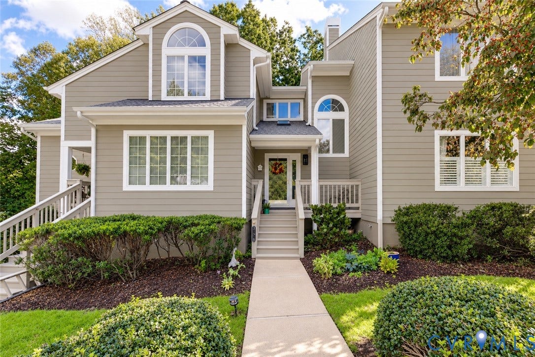 3131 Stony Point Road, #B, Richmond, VA 23235 Multi-level exterior with dormer windows, a prominent arched window, and a gabled roofline