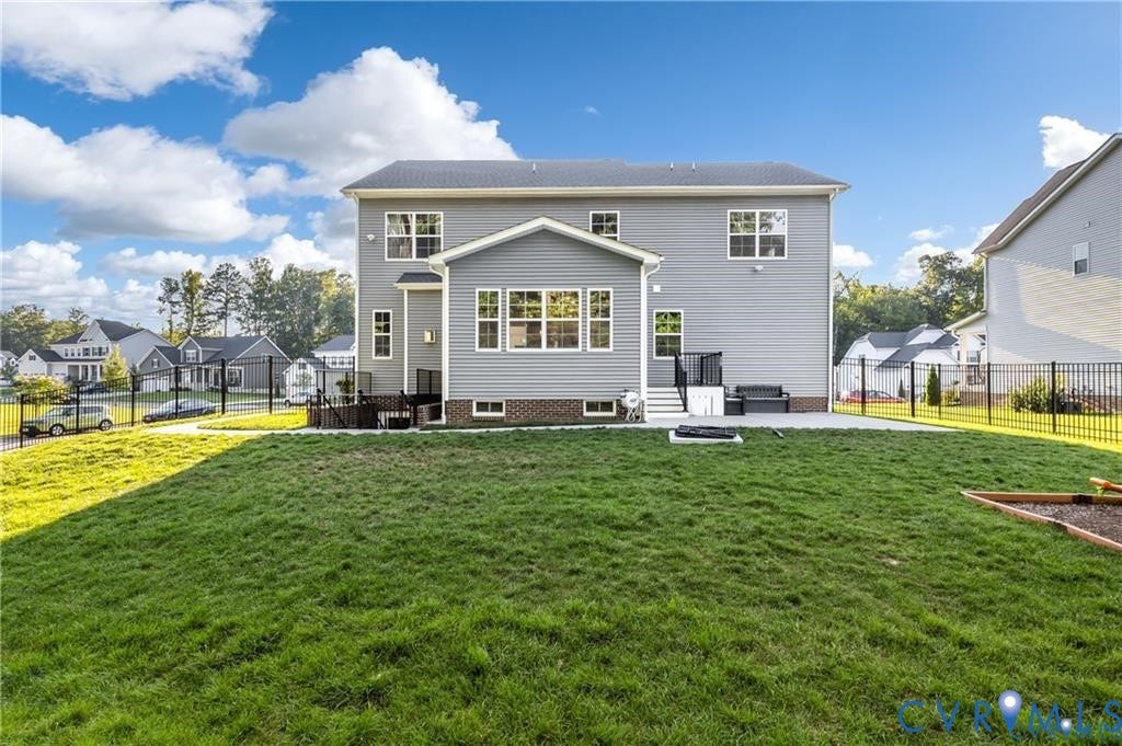 9119 Moldova Road, Haynes Bridge, Chesterfield, VA 23832 Back of home, patio, fenced back yard