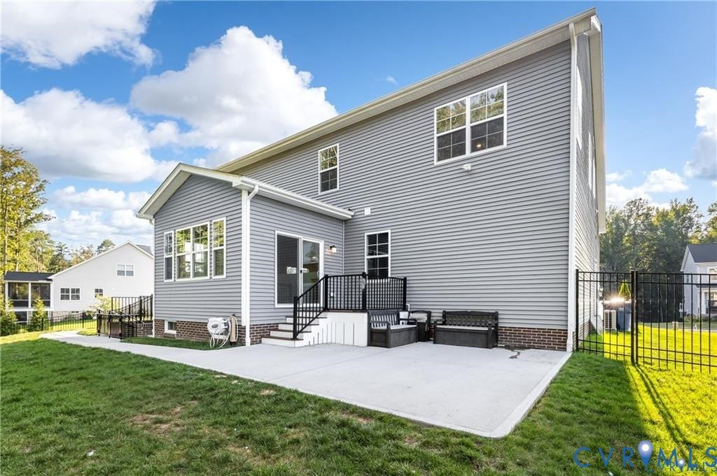 9119 Moldova Road, Haynes Bridge, Chesterfield, VA 23832 Back of home, patio, fenced in backyard