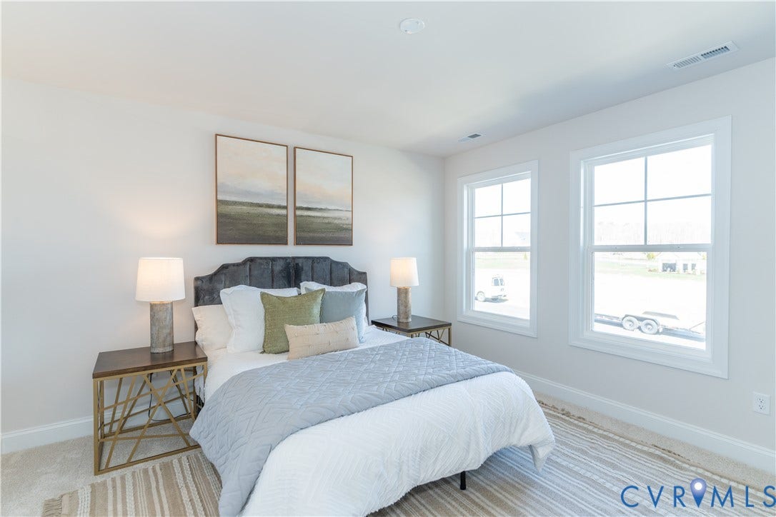 Photos of a similar home in the community. Optional features and finished may be demonstrated.