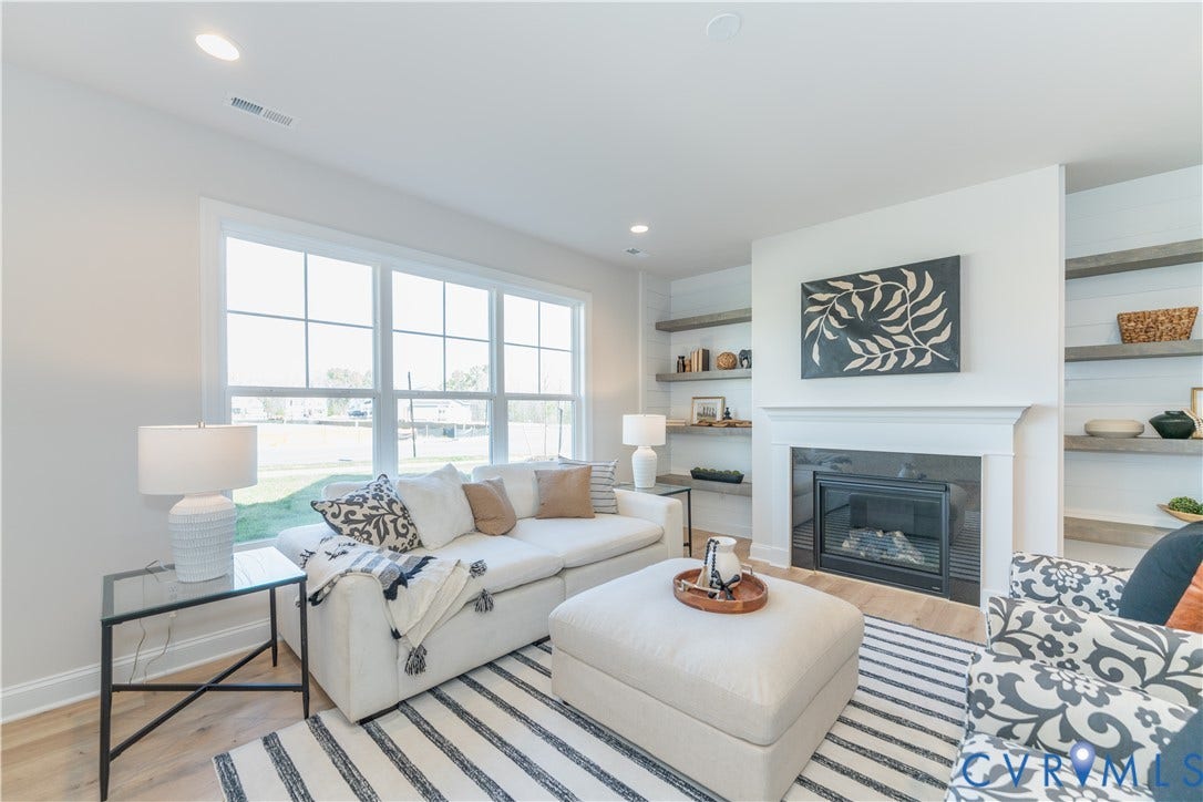 Photos of a similar home in the community. Optional features and finished may be demonstrated.