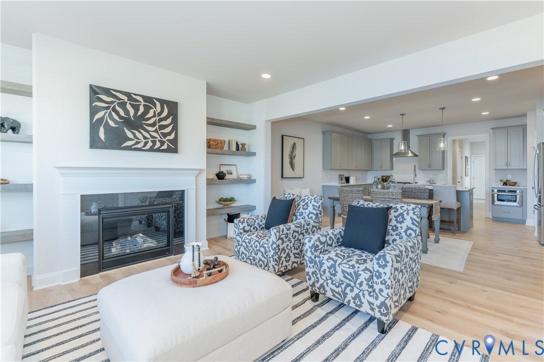 Photos of a similar home in the community. Optional features and finished may be demonstrated.