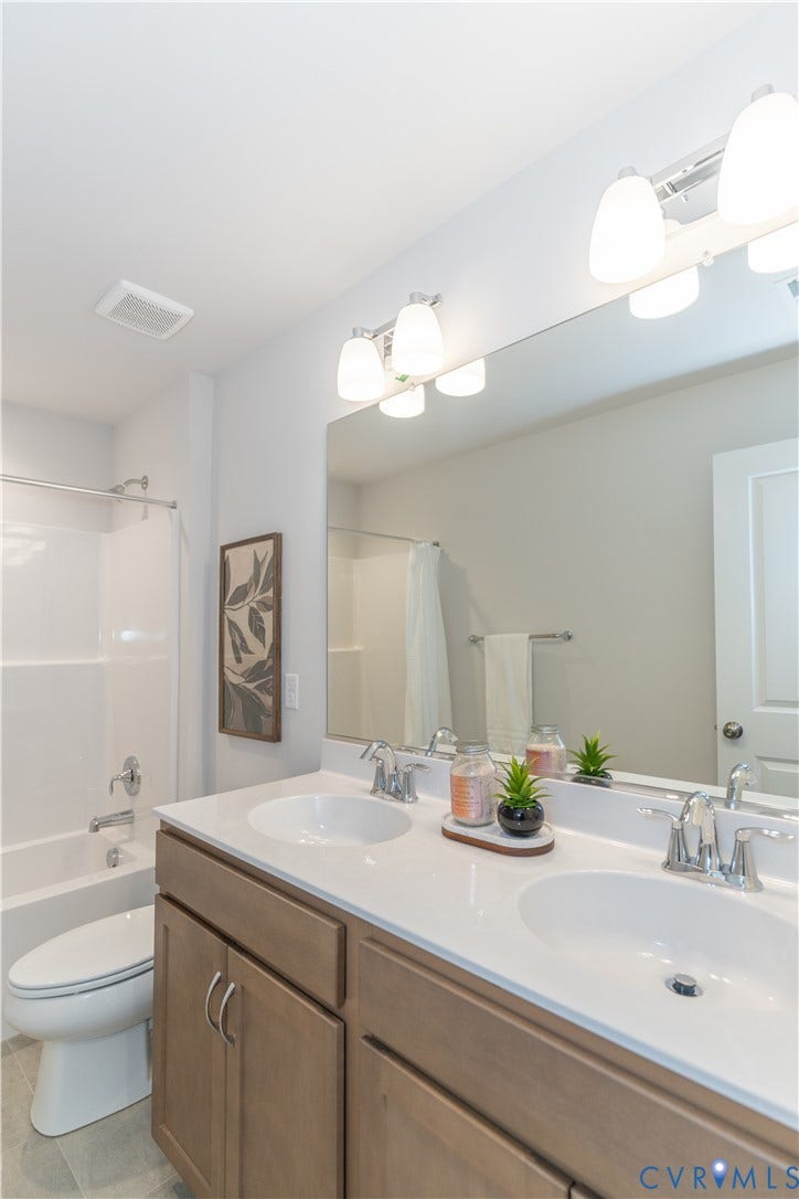 Photos of a similar home in the community. Optional features and finished may be demonstrated.