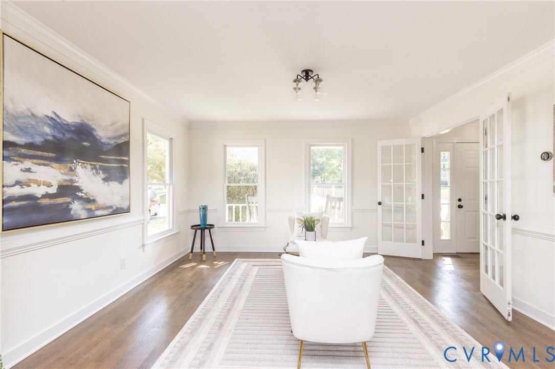 Recessed lighting, wood-finish flooring, white paneled walls, and french doors with glass panels