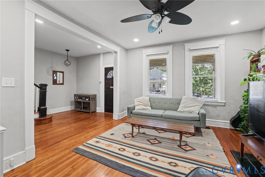 Hardwood flooring, recessed lighting, and a ceiling fan with integrated lighting