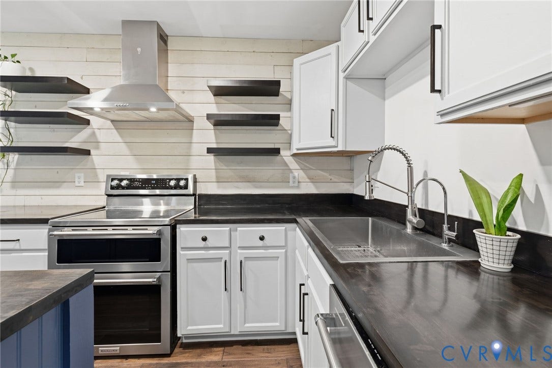 Updated kitchen with butcher block countertops