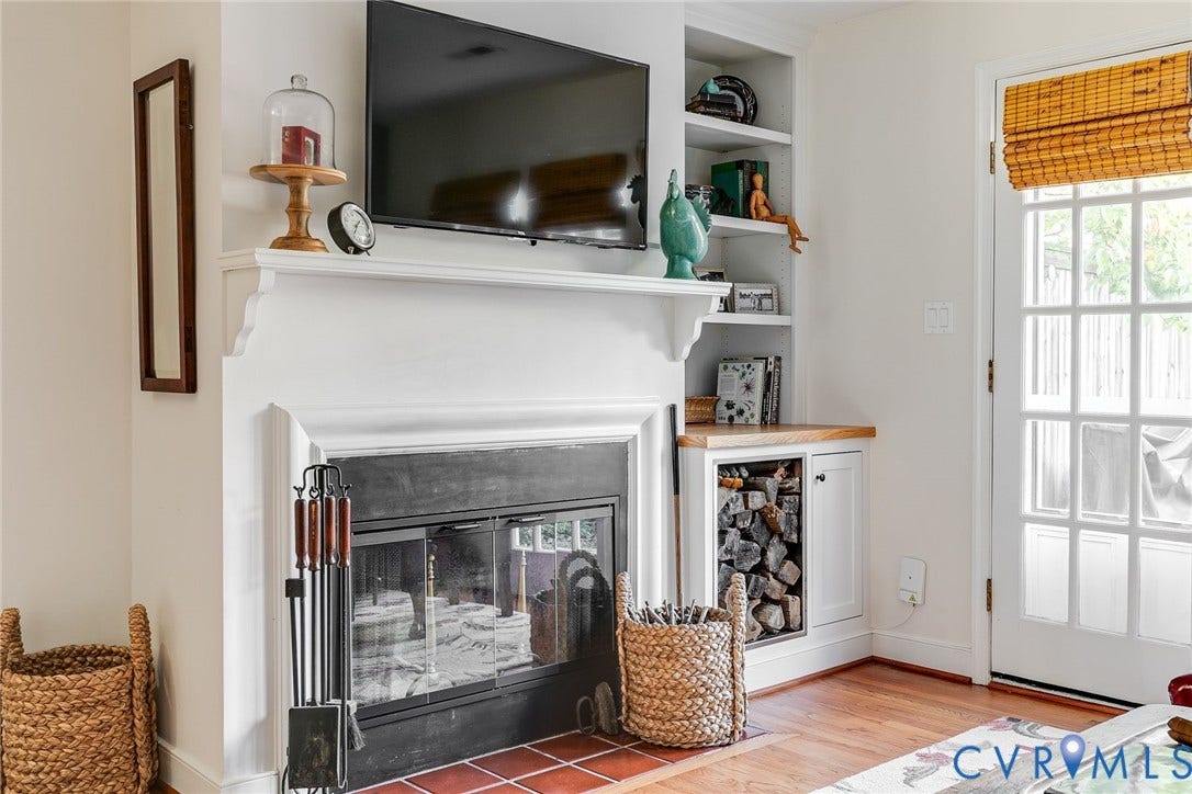 Handsome millwork, wood burning fireplace