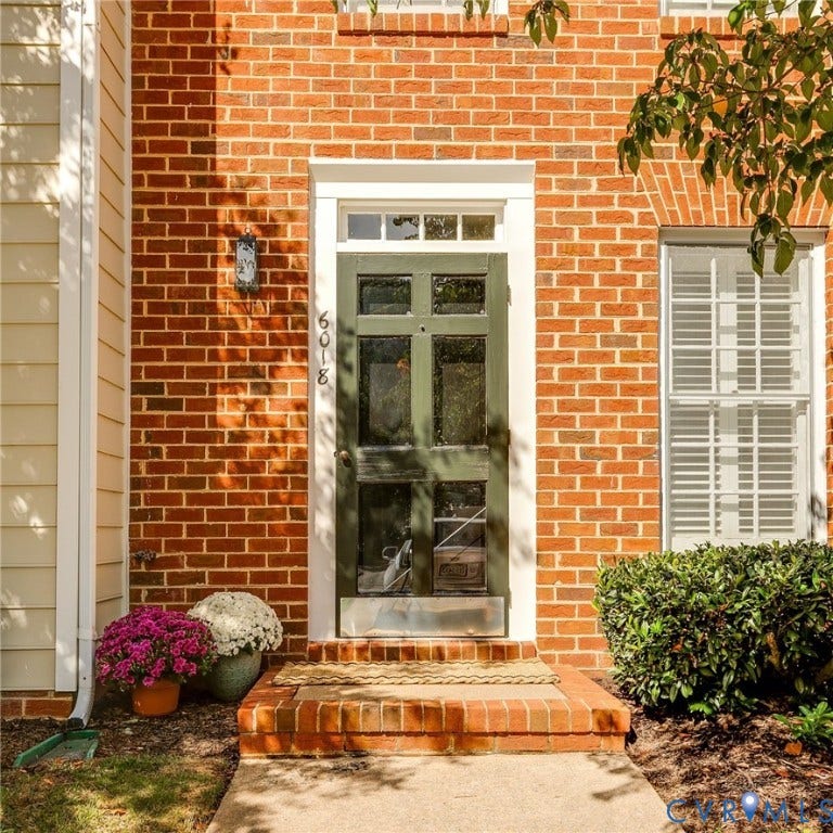 Handsome storm door and welcoming entrance