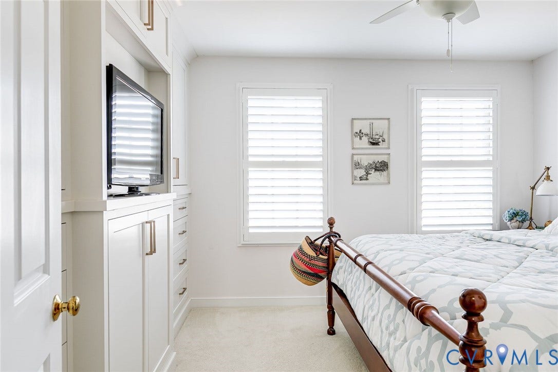 Two windows, ceiling fan