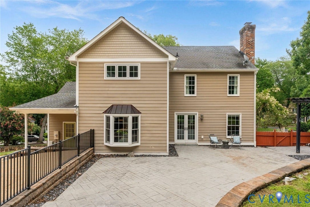 606 Westham Woods Drive, Tuckahoe, Henrico, VA 23229 Expansive patio with decorative retaining wall, leading to a covered porch entry