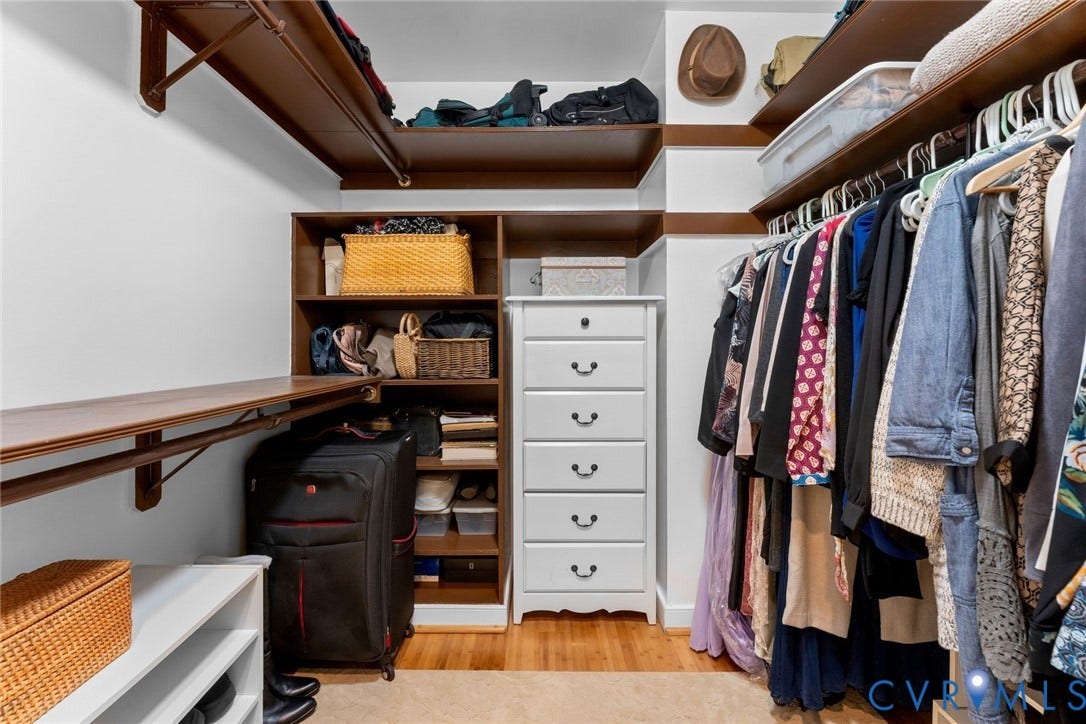 606 Westham Woods Drive, Tuckahoe, Henrico, VA 23229 Built-in closet system featuring hardwood flooring, white walls, and a white six-drawer dresser with dark hardware