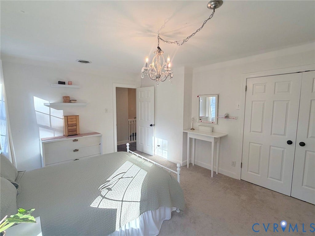 606 Westham Woods Drive, Tuckahoe, Henrico, VA 23229 Recessed lighting, wood-finish flooring, white walls, and a chandelier with candle-style bulbs