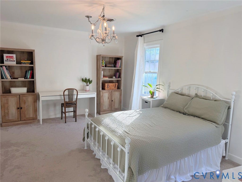 606 Westham Woods Drive, Tuckahoe, Henrico, VA 23229 Light-colored wall finishes, chandelier lighting fixture, window with natural light, and soft carpeting