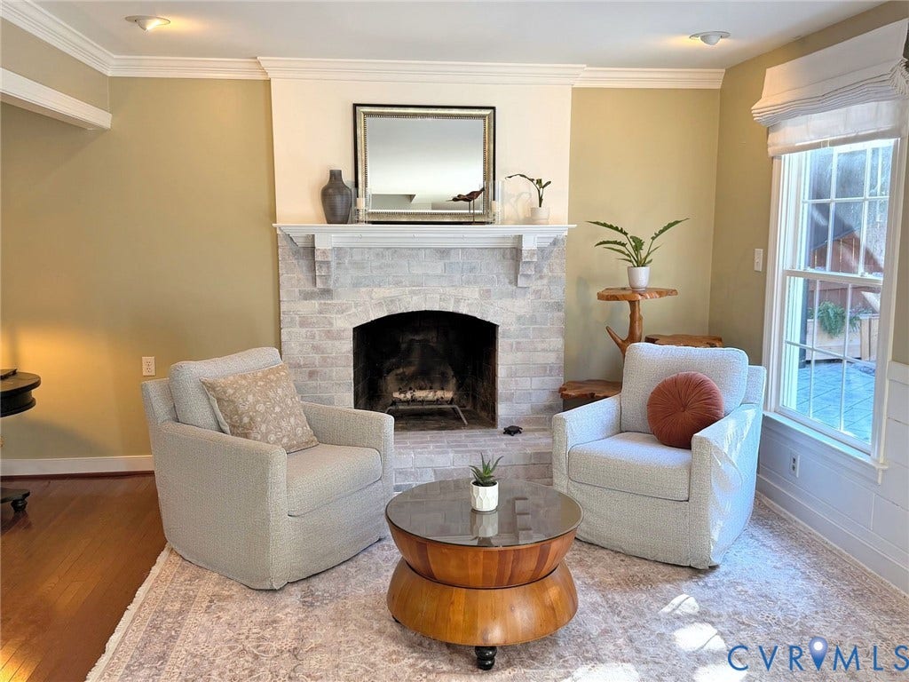 606 Westham Woods Drive, Tuckahoe, Henrico, VA 23229 Brick fireplace with a substantial mantelpiece and hearth