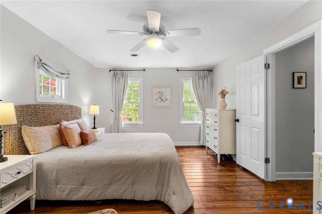 606 Westham Woods Drive, Tuckahoe, Henrico, VA 23229 Hardwood flooring, painted interior walls, ceiling fan with integrated lighting, multiple windows, and a panel door