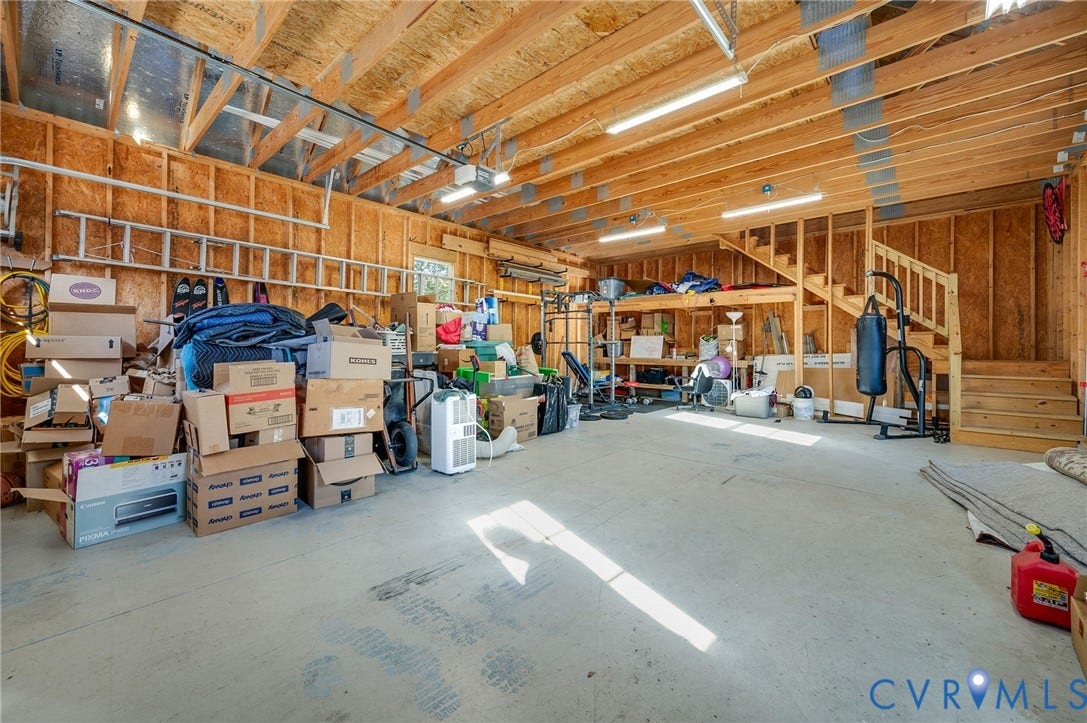 Two large storage areas over garage