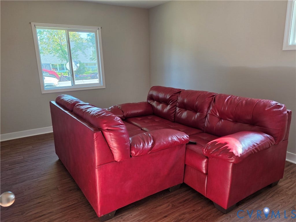 Wood-finish flooring with light neutral wall paint