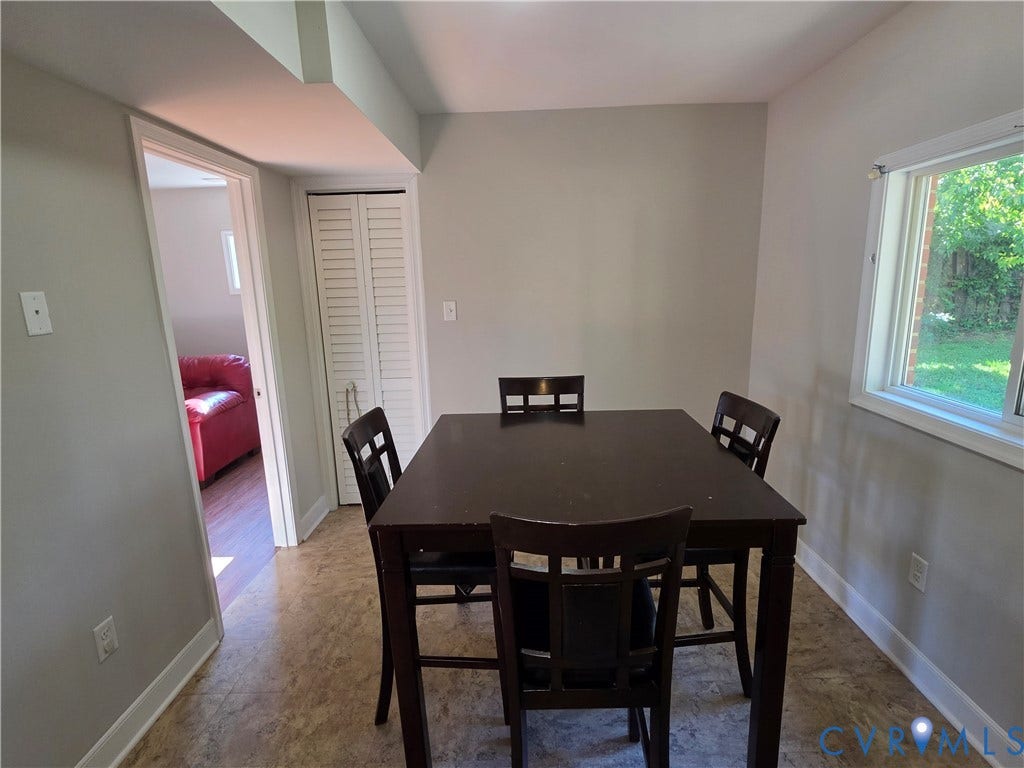 Recessed window, louvered bi-fold closet, and durable flooring