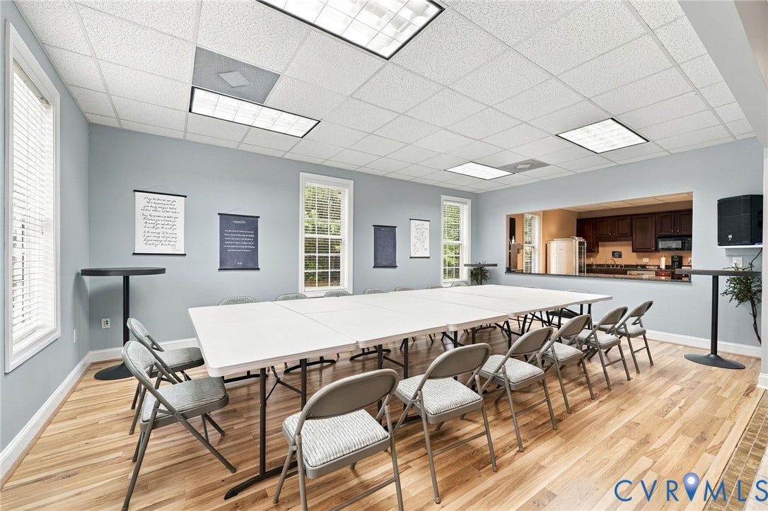 Wood-finish flooring with a tile inlay
