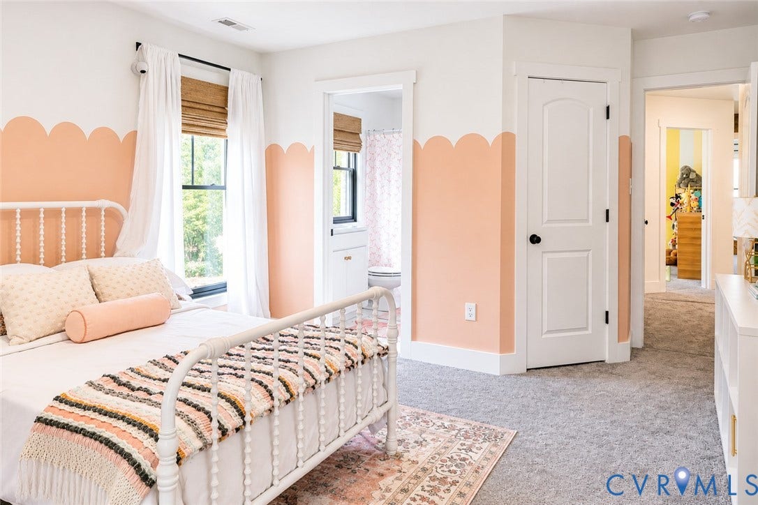 6265 Bushnell Drive, Rochambeau Estates, New Kent, VA 23124 Wall-to-wall carpeting throughout, a window with woven wood shades, and a white arch-top interior door