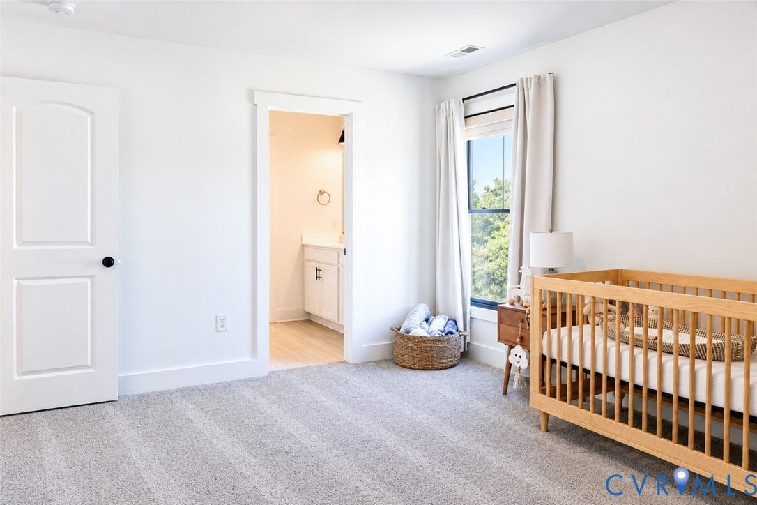 6265 Bushnell Drive, Rochambeau Estates, New Kent, VA 23124 Light-colored carpeting with a subtle stripe pattern