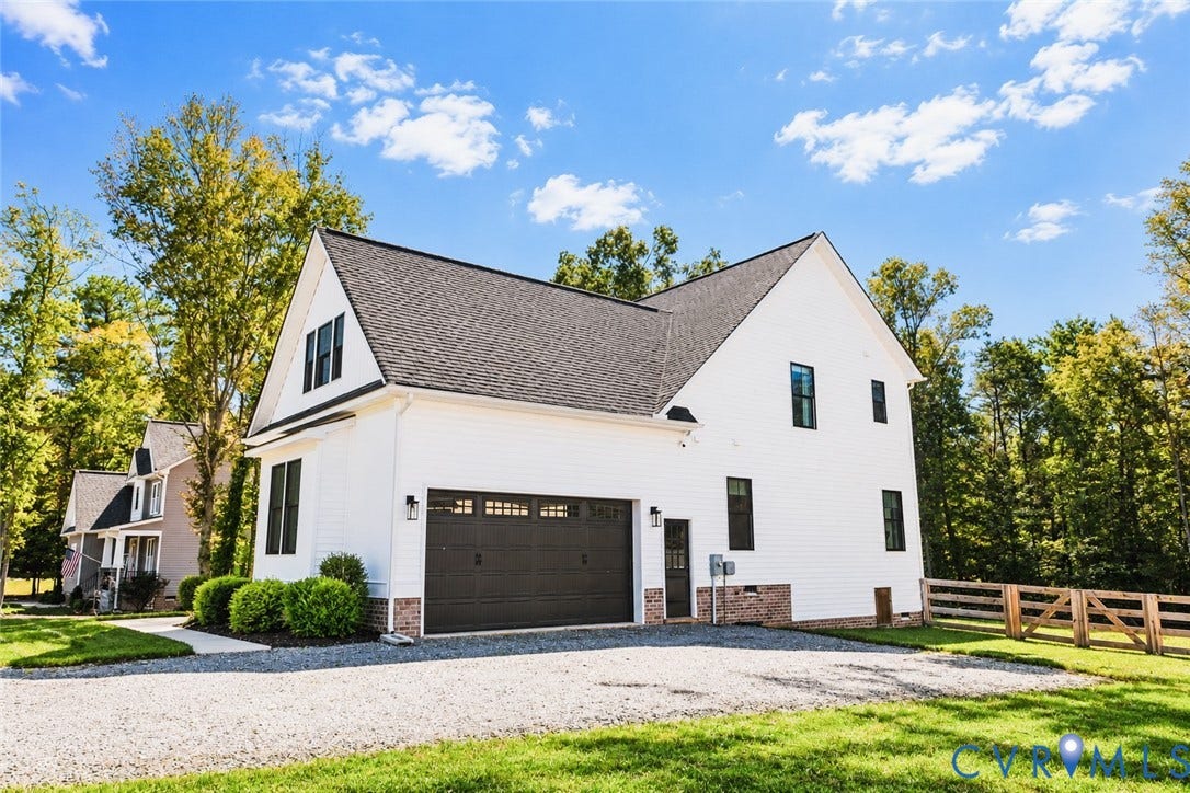 6265 Bushnell Drive, Rochambeau Estates, New Kent, VA 23124 White exterior siding with a dark asphalt shingle roof