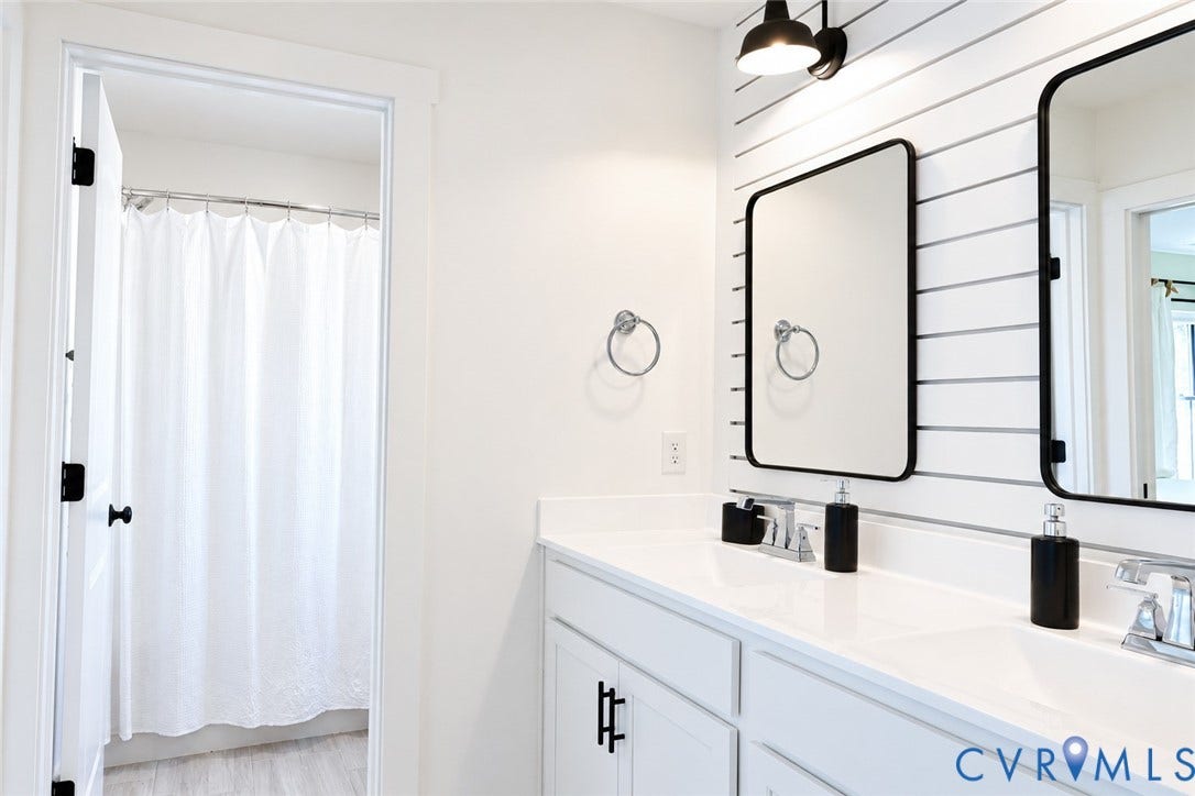 6265 Bushnell Drive, Rochambeau Estates, New Kent, VA 23124 Dual vanity with white countertops and undermount sinks