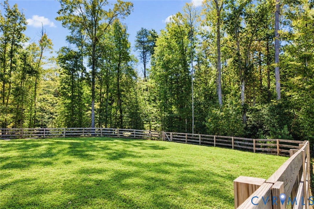 6265 Bushnell Drive, Rochambeau Estates, New Kent, VA 23124 Expansive fenced green space bordered by mature trees