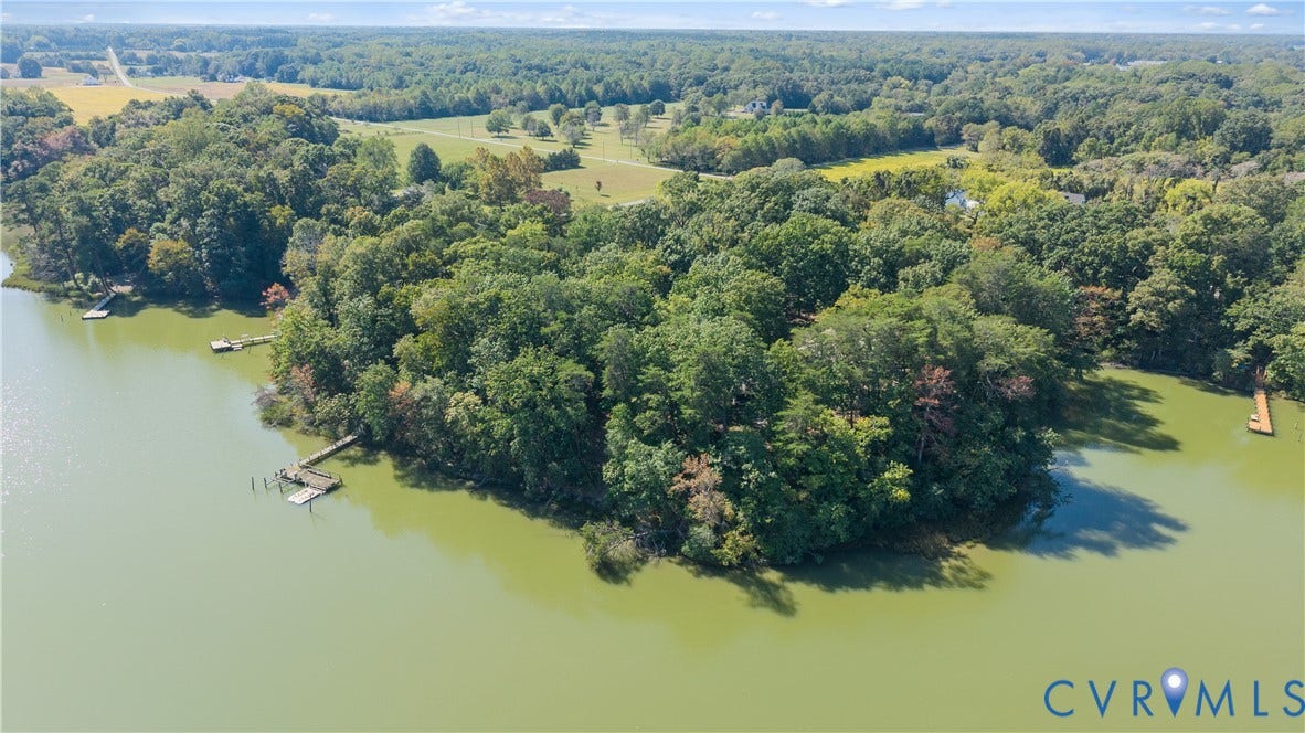 Wooded peninsula with multiple private docks
