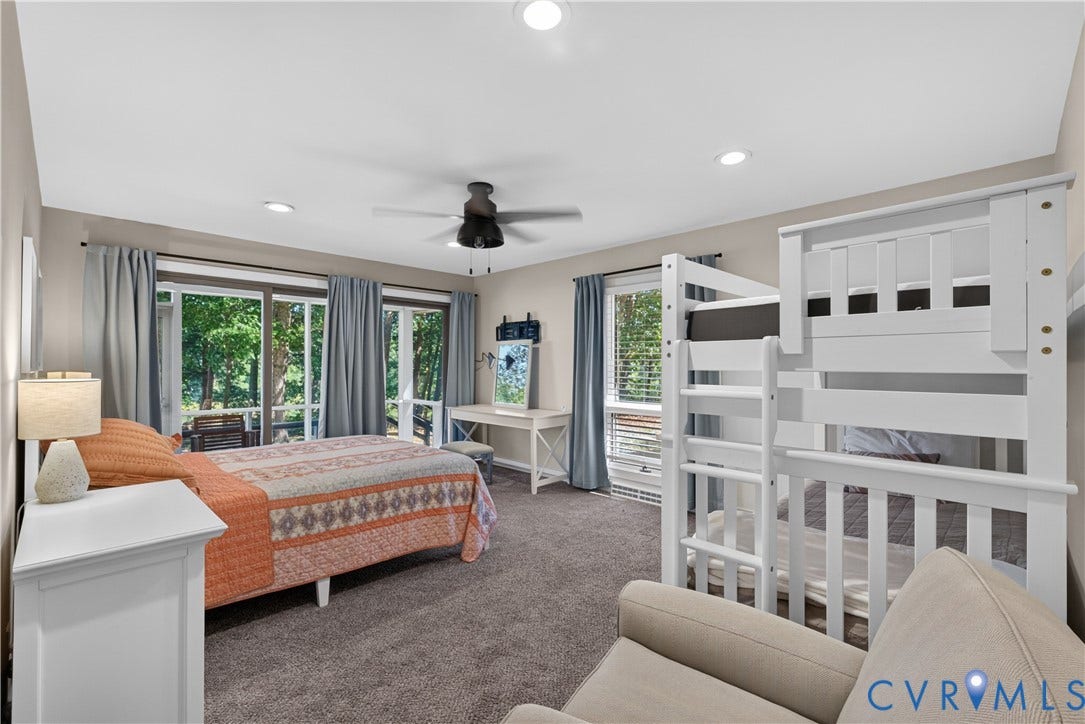 Recessed lighting, ceiling fan, and carpeted flooring