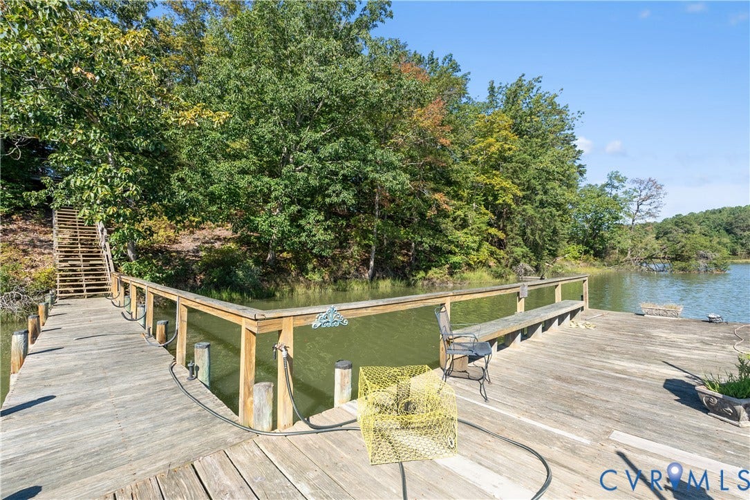Wood-finish dock with railing and built-in bench