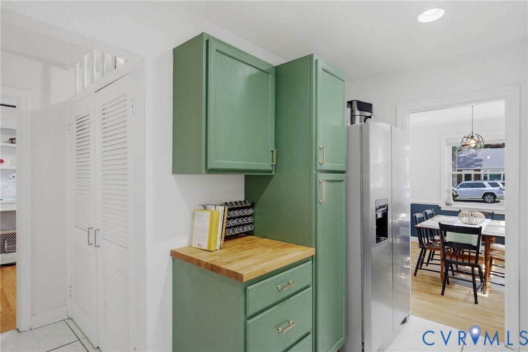 Quartz & butcher block countertops, tile floors