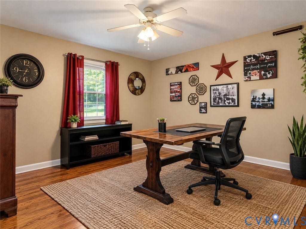 8251 Old Roxbury Road, Quinton, VA 23141 Room featuring wood-finish flooring, a central ceiling fan with integrated lighting, and a single-pane window