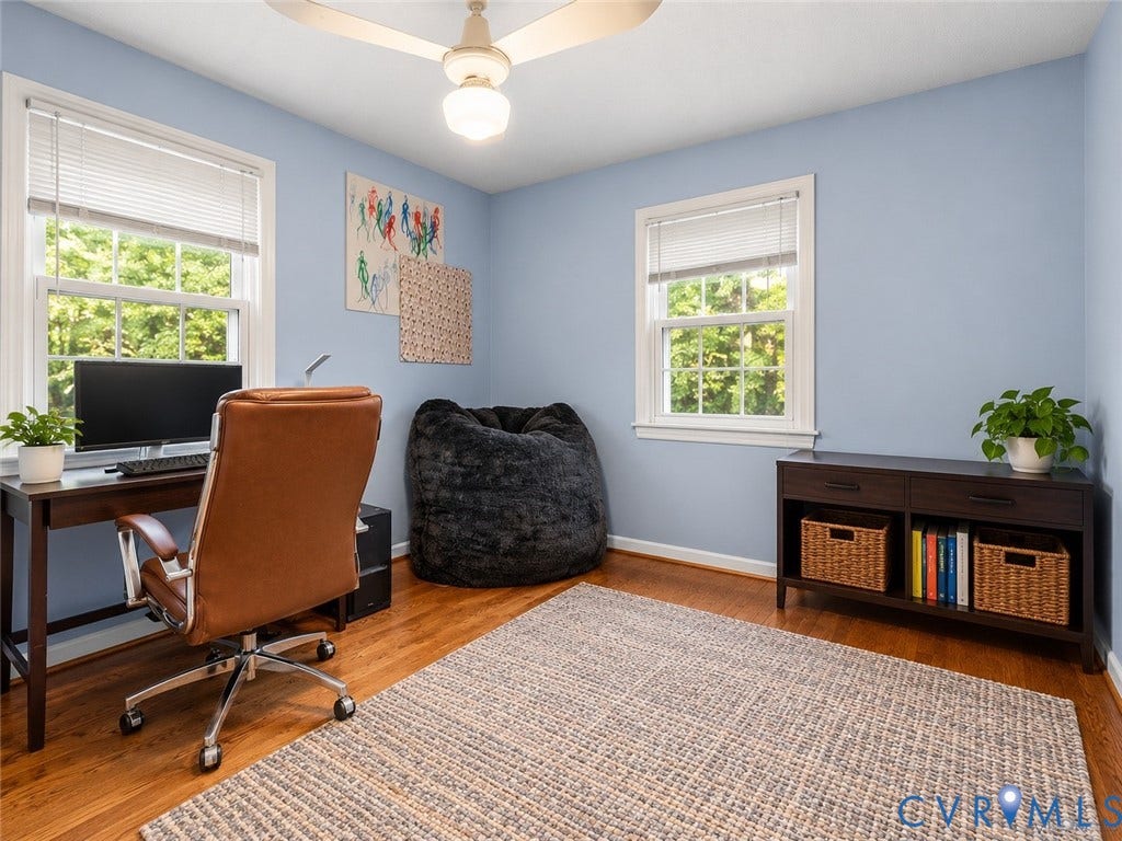 8251 Old Roxbury Road, Quinton, VA 23141 Wood-finish flooring, dual windows with horizontal blinds, and a central ceiling fan with integrated lighting