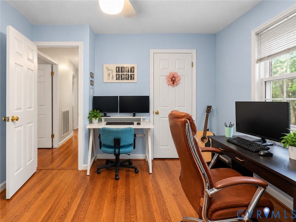 8251 Old Roxbury Road, Quinton, VA 23141 Wood-finish flooring, multi-panel interior doors, and a double-hung window with horizontal blinds