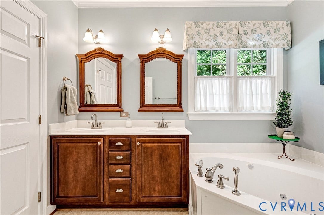 360 Laurel Drive, Aylett, VA 23009 Dual wood-finish vanities with undermount sinks and individual mirrors