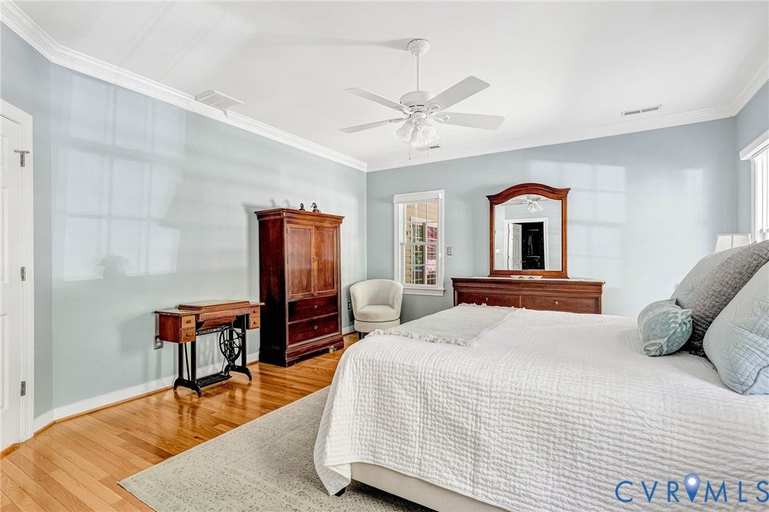 360 Laurel Drive, Aylett, VA 23009 Hardwood flooring, crown molding, white ceiling fan, and recessed window