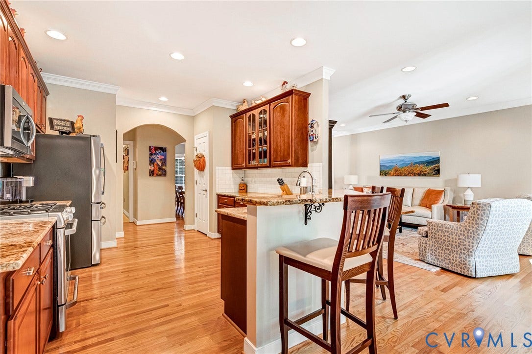 360 Laurel Drive, Aylett, VA 23009 Open-concept kitchen with wood-finish flooring, recessed lighting, and granite countertops