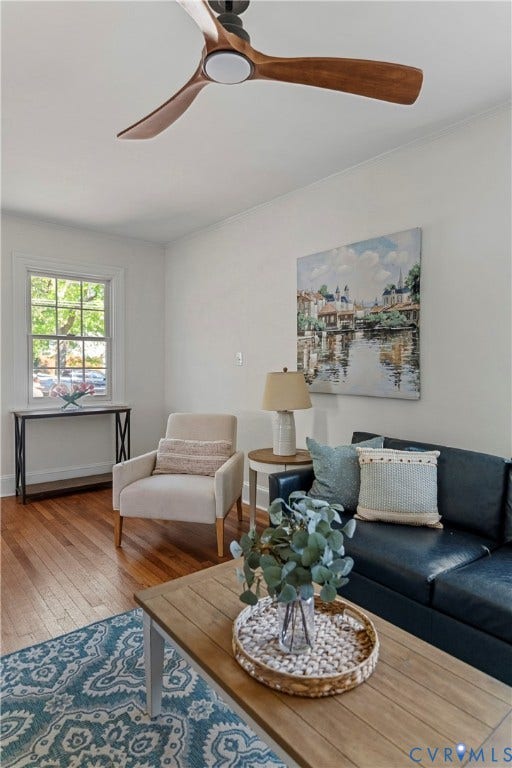 2601 Greenway Avenue, Lakeside, Henrico, VA 23228 Interior space featuring hardwood flooring, a three-blade wooden ceiling fan with integrated lighting, and a single-hung window with traditional casing
