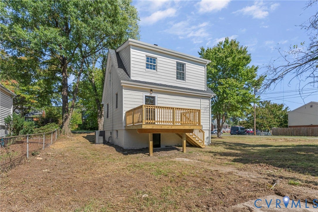 2601 Greenway Avenue, Lakeside, Henrico, VA 23228 Two-story exterior featuring lap siding, an elevated wood deck with railing, and a walk-out basement level