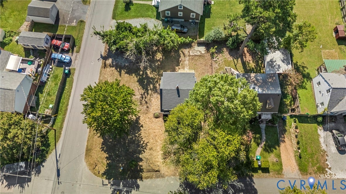 2601 Greenway Avenue, Lakeside, Henrico, VA 23228 Aerial perspective of an expansive lot featuring mature trees, a detached storage structure, and direct street frontage