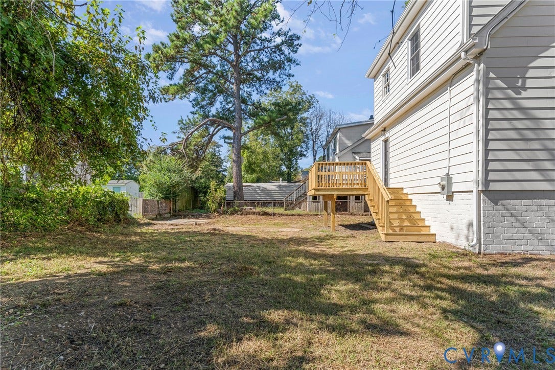 2601 Greenway Avenue, Lakeside, Henrico, VA 23228 Exterior features include horizontal siding, a painted brick foundation, and an elevated wooden deck with stairs
