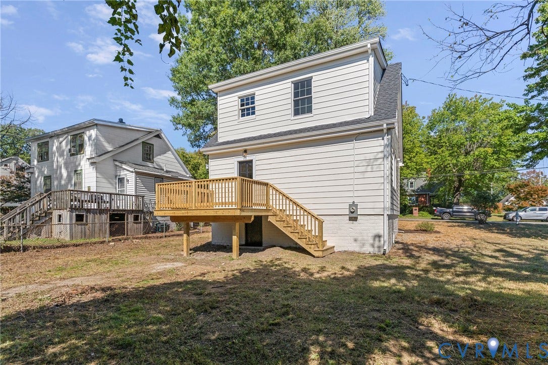 2601 Greenway Avenue, Lakeside, Henrico, VA 23228 Two-story exterior featuring light-toned horizontal siding, a raised wood deck with balustrade, and a painted brick foundation
