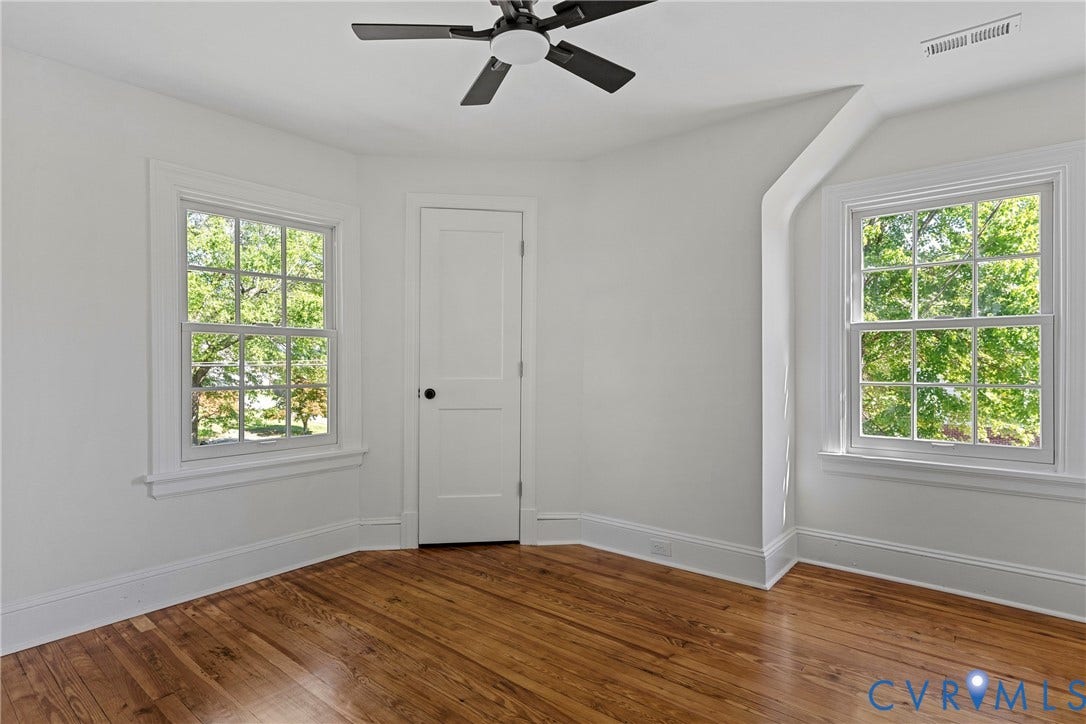 2601 Greenway Avenue, Lakeside, Henrico, VA 23228 Room featuring wood-finish flooring, two multi-pane windows, a central ceiling fan, and a paneled interior door