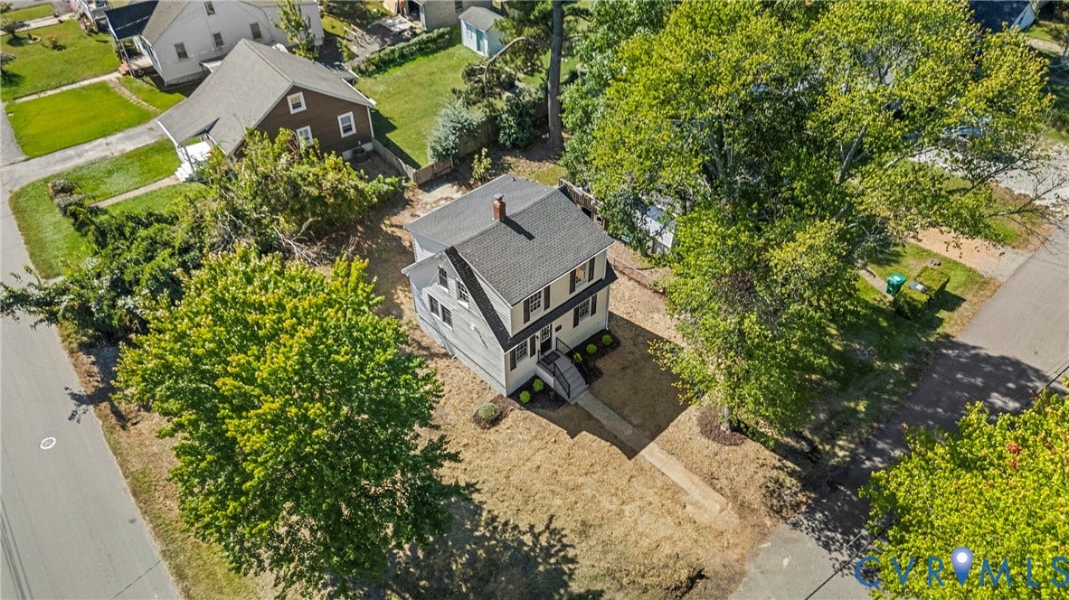 2601 Greenway Avenue, Lakeside, Henrico, VA 23228 Two-story exterior featuring light-toned siding, a dark shingled roof, a chimney, and mature trees on a corner lot