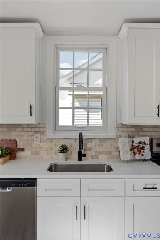 2601 Greenway Avenue, Lakeside, Henrico, VA 23228 White shaker-style cabinetry with matte black hardware, stone-finish backsplash, undermount stainless steel sink, matte black gooseneck faucet, and quartz countertop