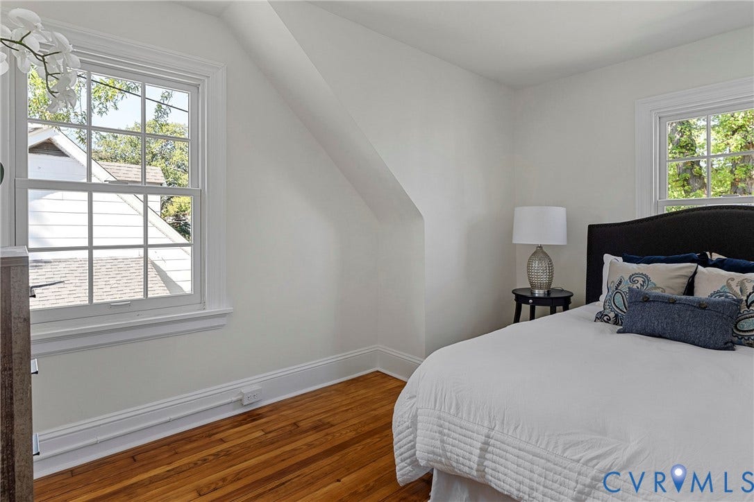 2601 Greenway Avenue, Lakeside, Henrico, VA 23228 Bedroom featuring slanted architectural ceiling lines, wood-finish flooring, and multi-pane double-hung windows