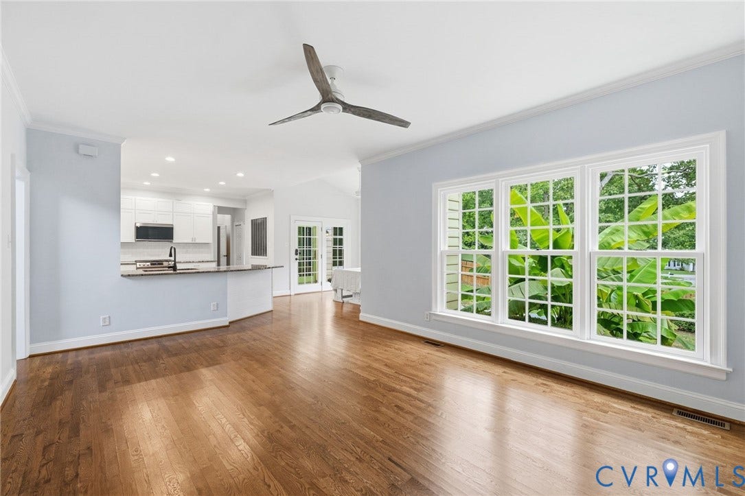 Living room with view of kitchen